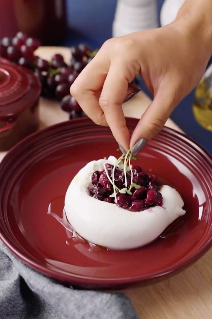 Burrata con uvas asadas
